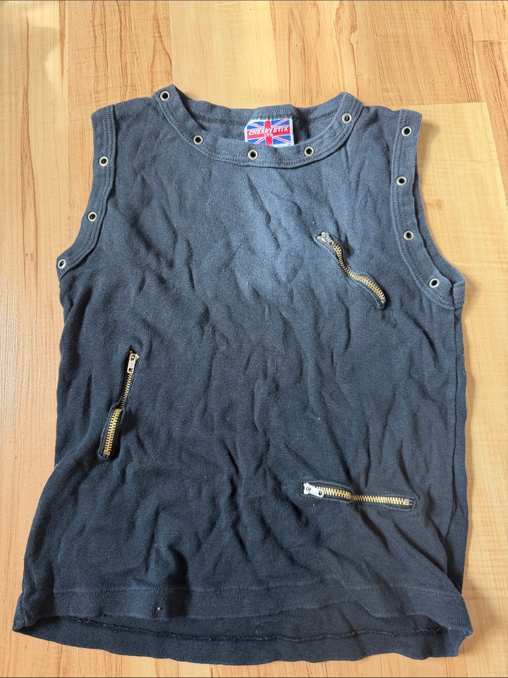 Cherry Stix Black Girls' Sleeveless Tank with Gold Zipper Accents